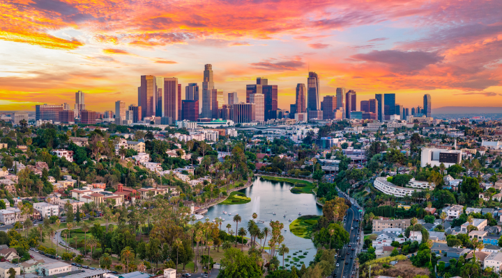 Aerial view of the downtown Los Angeles skyline, with Echo Park lake in the foreground.